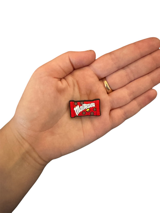 Malťesers chocolate shoe charm